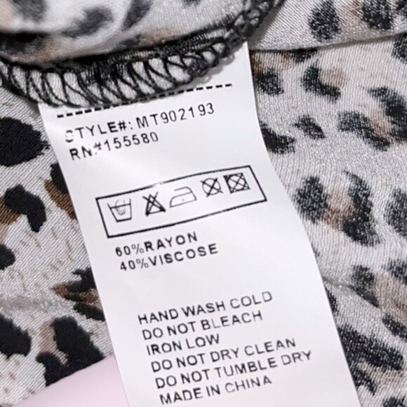 Free People Cheetah Print Blouse White Black Smocked Tie NWOT Womens Size Small - Picture 7 of 7